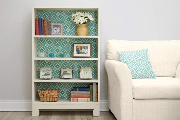 Enjoy your stylish revamped fabric-backed bookcase!